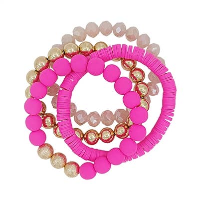 What's Hot - Pink Rubber, Crystal, and Gold Set of 4 Stretch Bracelets